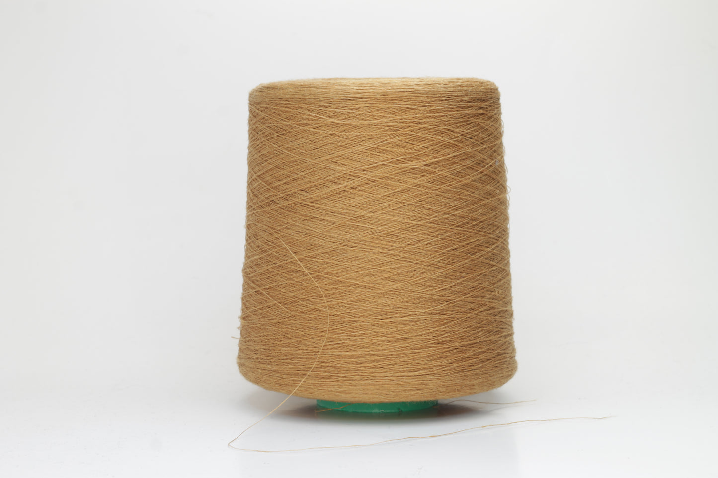 Fine, single-ply linen yarn in a Brown. Reveals a crisp texture and subtle natural sheen, typical of pure linen fiber.