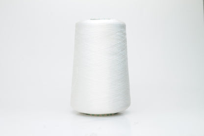 Close-up of brilliant white 100% silk yarn, single-ply strand with a smooth, highly lustrous surface, softly draped. Shimmering.