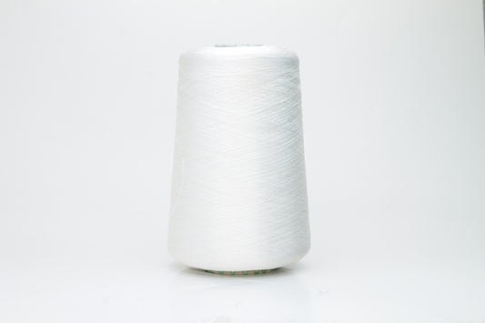 Close-up of brilliant white 100% silk yarn, single-ply strand with a smooth, highly lustrous surface, softly draped. Shimmering.