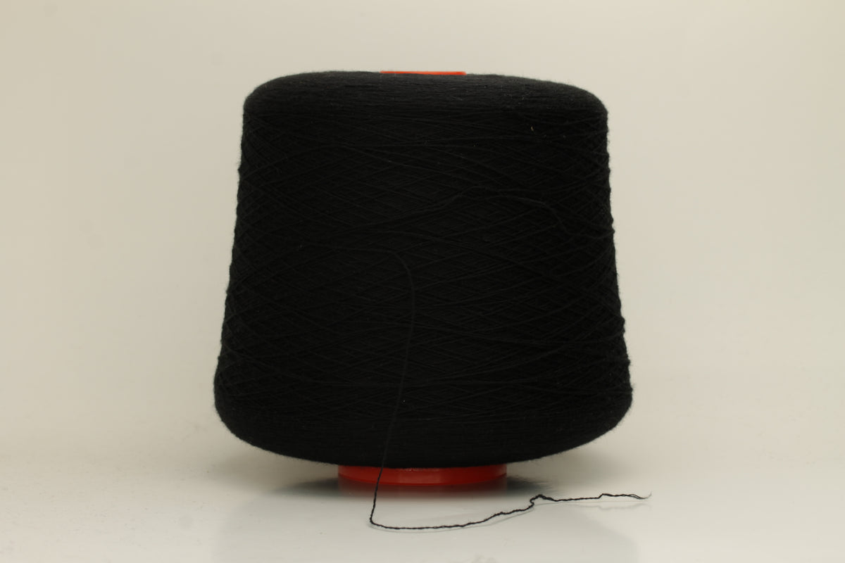 Rich, deep black 2-ply yarn with a fine, smooth twist; exhibits a subtle sheen and incredibly soft, uniform texture.