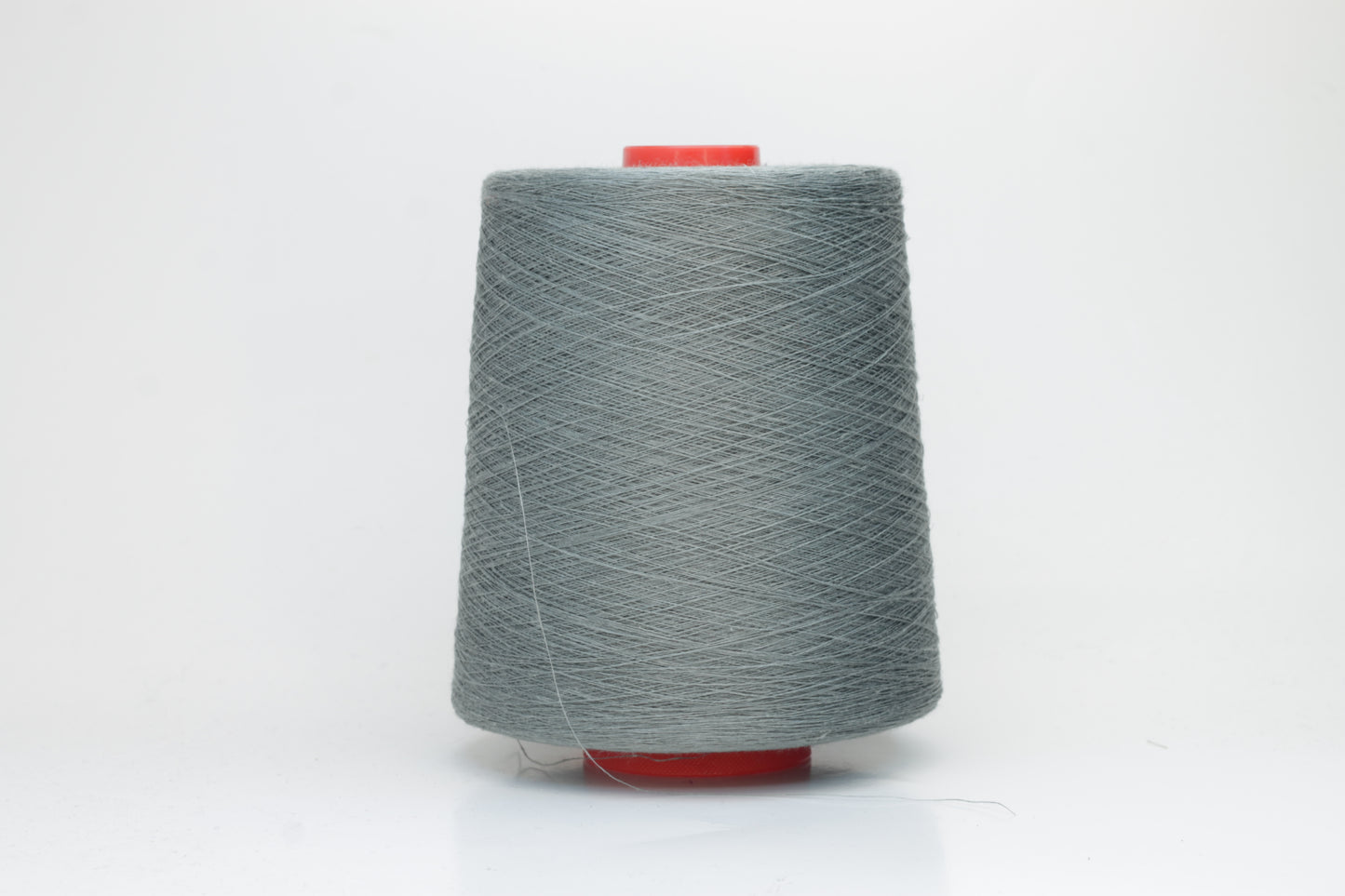 Fine, single-ply linen yarn in a rich Cannone. Reveals a crisp texture and subtle natural sheen, typical of pure linen fiber.