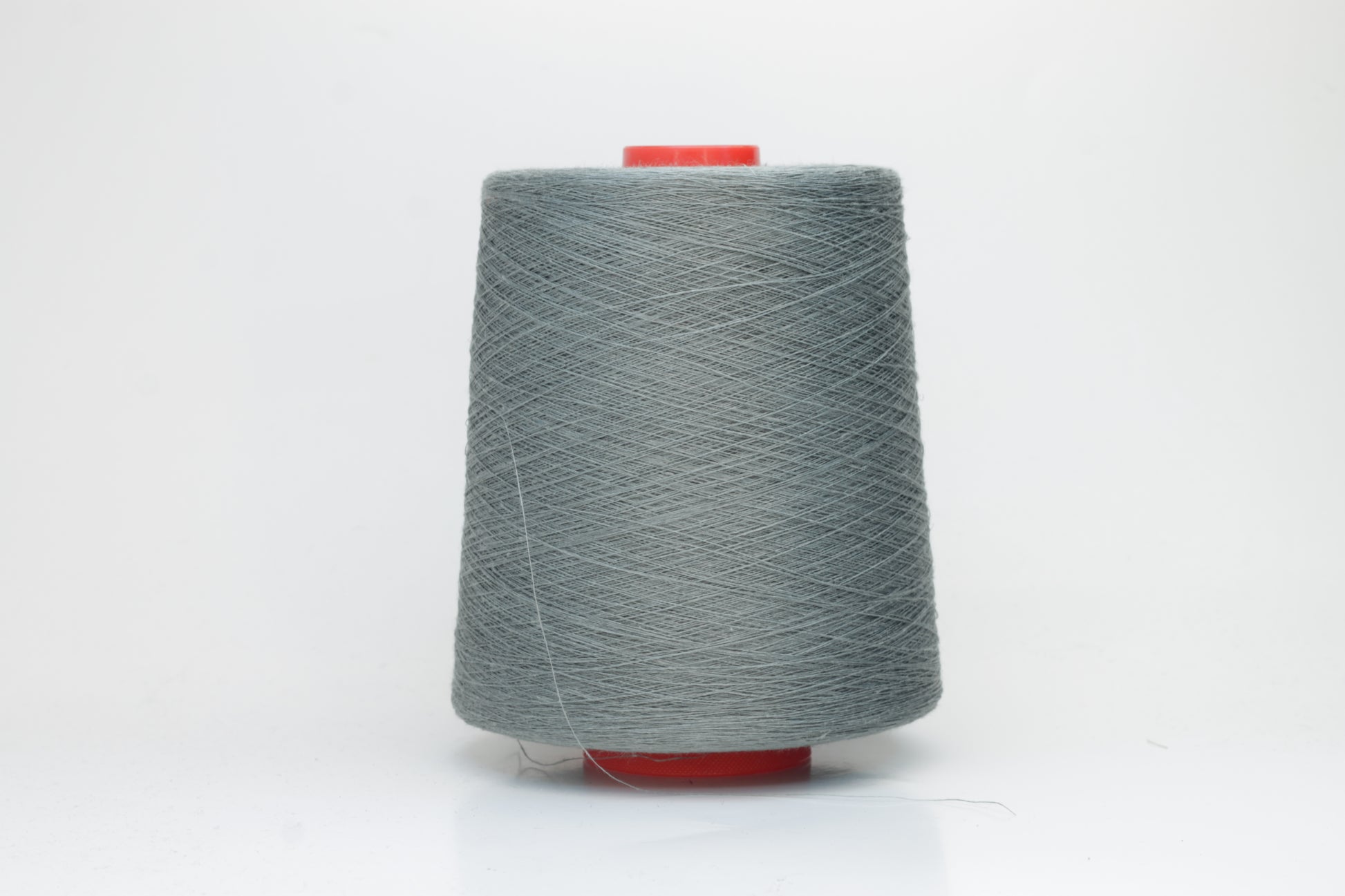 Fine, single-ply linen yarn in a rich Cannone. Reveals a crisp texture and subtle natural sheen, typical of pure linen fiber.