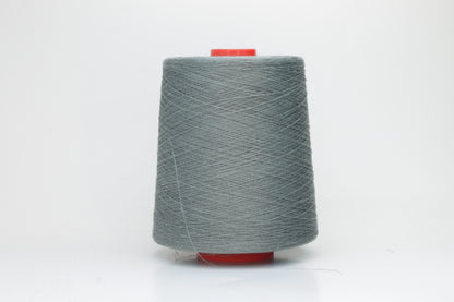 Fine, single-ply linen yarn in a rich Cannone. Reveals a crisp texture and subtle natural sheen, typical of pure linen fiber.