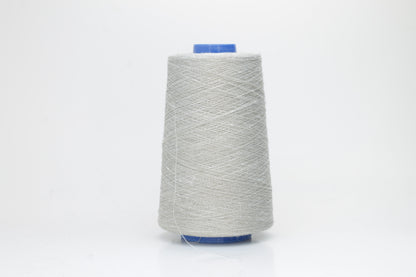 Fine, single-ply linen yarn in a rich Light Gray. Reveals a crisp texture and subtle natural sheen, typical of pure linen fiber.