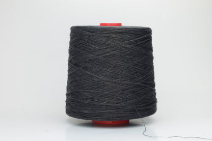 Fine, single-ply linen yarn in a rich Charcoal Black. Reveals a crisp texture and subtle natural sheen, typical of pure linen fiber.