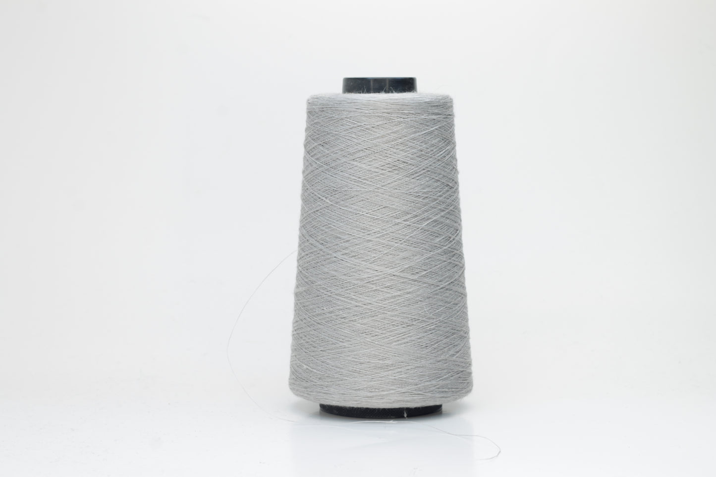 Fine, single-ply linen yarn in a rich Aluminum. Reveals a crisp texture and subtle natural sheen, typical of pure linen fiber.