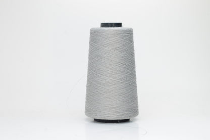 Fine, single-ply linen yarn in a rich Aluminum. Reveals a crisp texture and subtle natural sheen, typical of pure linen fiber.