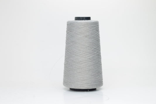 Fine, single-ply linen yarn in a rich Aluminum. Reveals a crisp texture and subtle natural sheen, typical of pure linen fiber.
