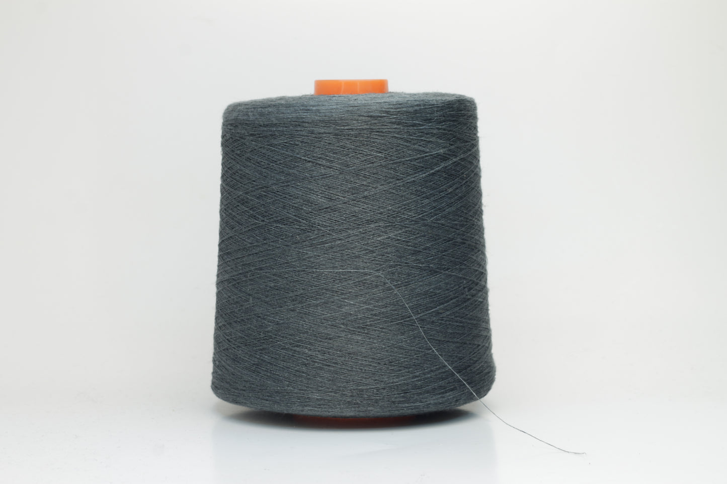 Fine, single-ply linen yarn in a rich Deep Sage Charcoal. Reveals a crisp texture and subtle natural sheen, typical of pure linen fiber.