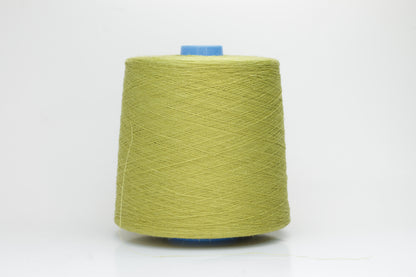 Fine, single-ply linen yarn in a rich Pistachio. Reveals a crisp texture and subtle natural sheen, typical of pure linen fiber.