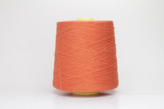 Fine, single-ply linen yarn in a rich Orange. Reveals a crisp texture and subtle natural sheen, typical of pure linen fiber.