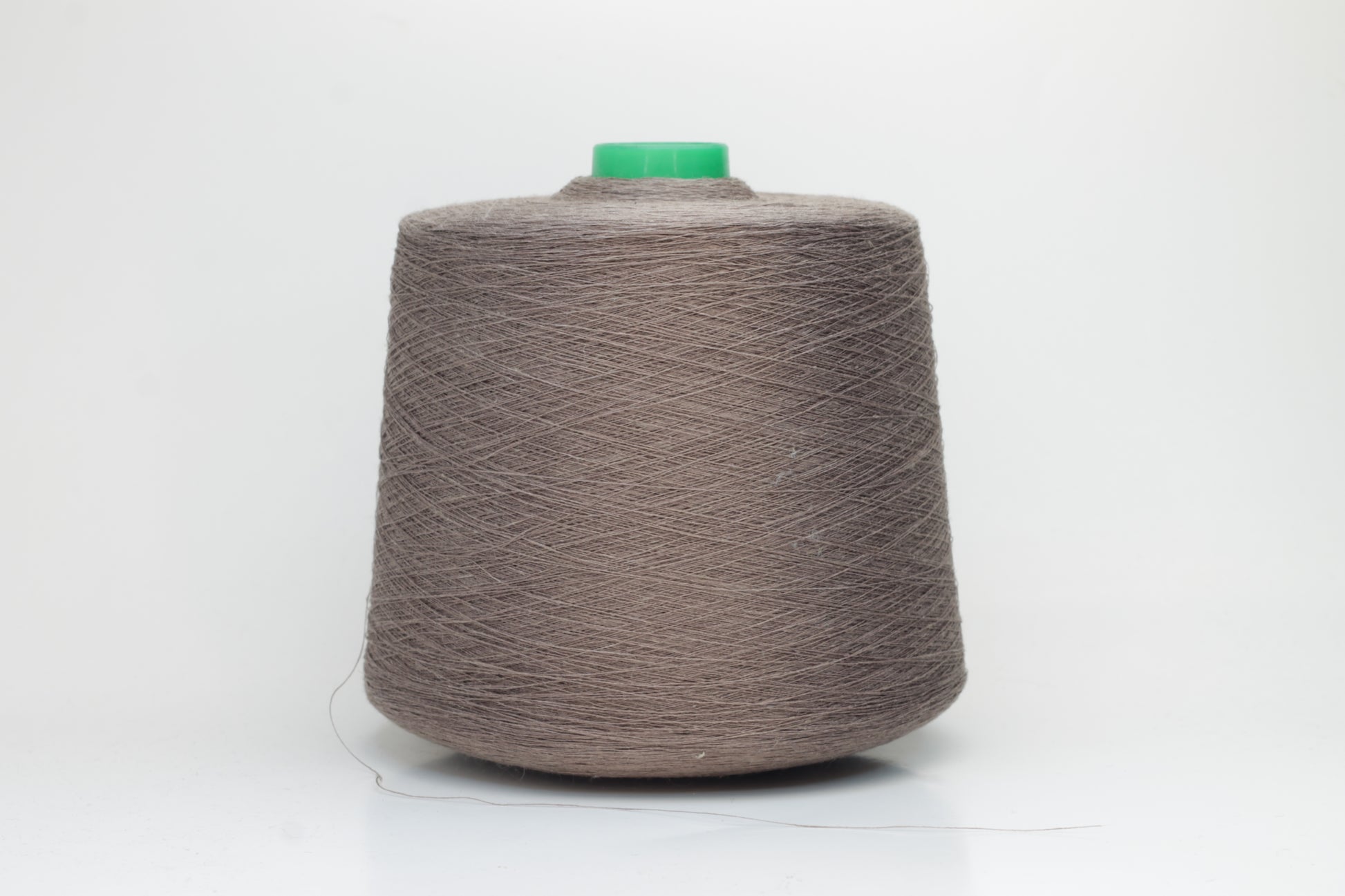 Fine, single-ply linen yarn in a rich Talpa. Reveals a crisp texture and subtle natural sheen, typical of pure linen fiber.