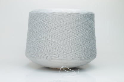 Close-up shot of Zegna Baruffa Merinos Cashwool yarn in Light Gray, showcasing the fine ply twist and dense, fluffy texture with subtle sheen.