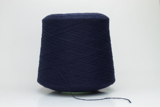 Luxurious Navy cashmere yarn, two-ply twist with a subtle sheen, displaying deep, consistent color and a fine, soft texture ready for crafting.
