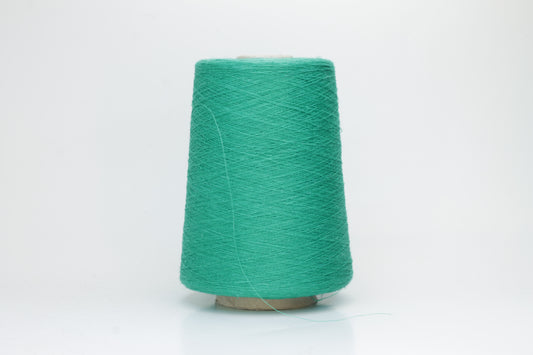 Fine, single-ply linen yarn in a rich Green. Reveals a crisp texture and subtle natural sheen, typical of pure linen fiber.