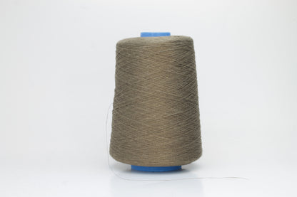 Fine, single-ply linen yarn in a rich Sughero. Reveals a crisp texture and subtle natural sheen, typical of pure linen fiber.