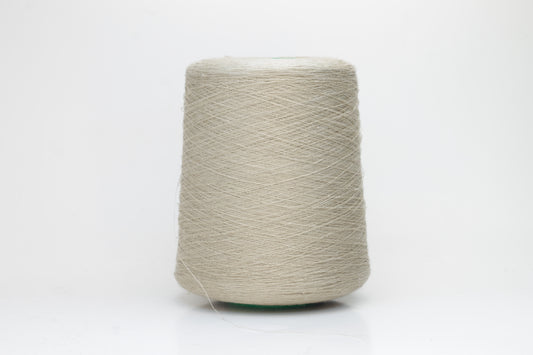 Fine, single-ply linen yarn in a rich Oatmeal. Reveals a crisp texture and subtle natural sheen, typical of pure linen fiber.