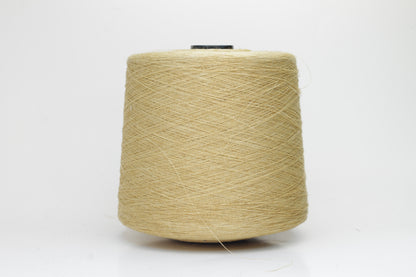 Fine, single-ply linen yarn in a rich Pale Butter. Reveals a crisp texture and subtle natural sheen, typical of pure linen fiber.