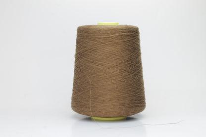 Fine, single-ply linen yarn in a rich Cammello. Reveals a crisp texture and subtle natural sheen, typical of pure linen fiber.