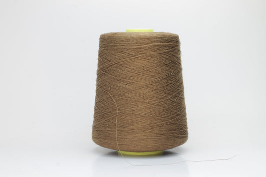 Fine, single-ply linen yarn in a rich Cammello. Reveals a crisp texture and subtle natural sheen, typical of pure linen fiber.