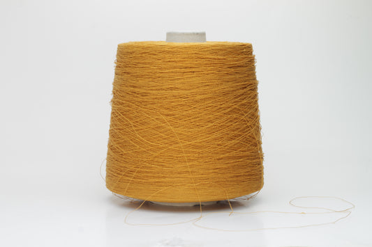 Close-up of a finely spun, vibrant orange yarn with a subtle, natural sheen. Its multi-filament structure shows a delicate twist, offering both crispness and soft resilience, suitable for textile artistry.