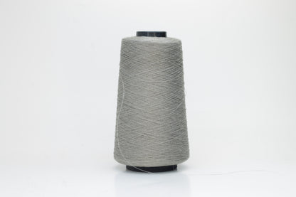 Fine, single-ply linen yarn in a rich Silver Gray. Reveals a crisp texture and subtle natural sheen, typical of pure linen fiber.