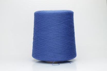 Close-up of luxurious petrol blue Merino wool yarn, two-ply twist with a soft, subtle sheen, and fine, consistent thread structure.