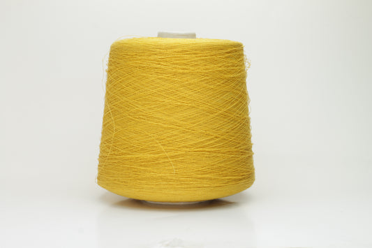 Close-up of a brightly twisted single-ply yarn, a sunny yellow color with a subtle matte finish and visible linen slubs throughout.