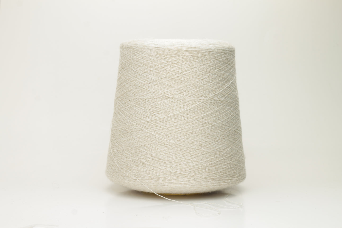 Merino 49%, Silk 30%, Lino 21% yarn on Cone. Nm 2/40, Loro Piana, Beige