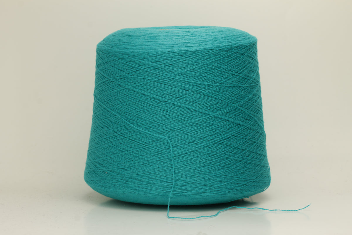 Vibrant grasshopper-green cashmere yarn. Soft, fine ply, subtle halo, and luxurious sheen. Displays rich, consistent color depth.