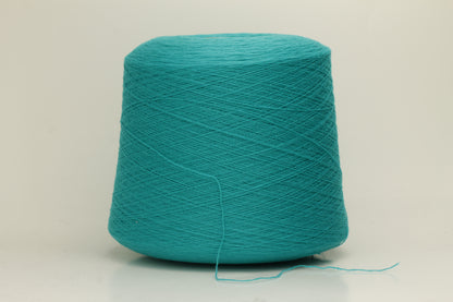 Vibrant grasshopper-green cashmere yarn. Soft, fine ply, subtle halo, and luxurious sheen. Displays rich, consistent color depth.