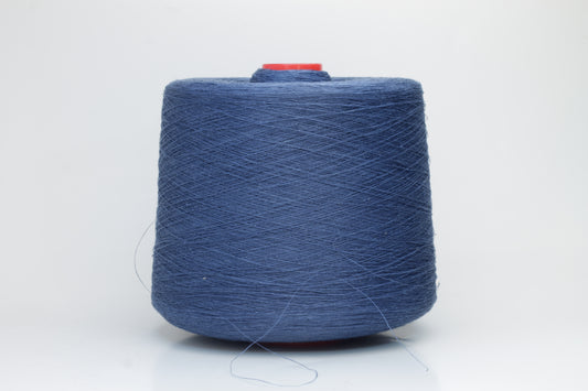 Fine, single-ply linen yarn in a rich Jeans. Reveals a crisp texture and subtle natural sheen, typical of pure linen fiber.