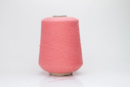 Coral 2-ply Alpaca Merino yarn, softly twisted with a gentle halo and subtle sheen, showcasing its deep, luxurious color saturation.