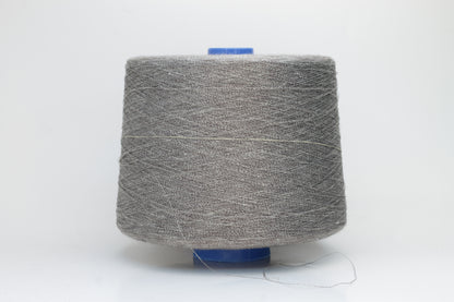 Fine, single-ply linen yarn in a rich Medium Heather Gray. Reveals a crisp texture and subtle natural sheen, typical of pure linen fiber.
