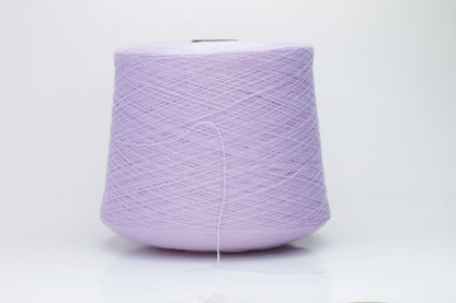 Close-up of soft, delicate two-ply cashmere yarn in a serene lavender hue, exhibiting a subtle halo and gentle sheen.