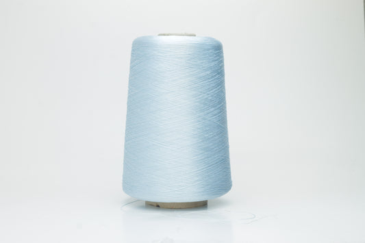 Fine, smooth, two-ply silk yarn in a vibrant sky blue. It exhibits a subtle sheen and a uniform, tight twist, reflecting light beautifully.