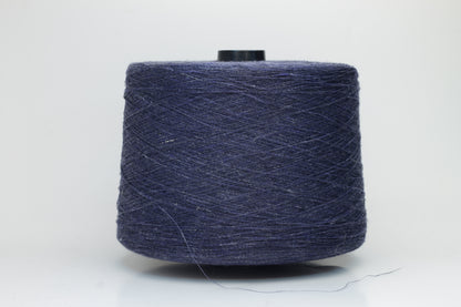 Fine, single-ply linen yarn in a rich Navy Blue. Reveals a crisp texture and subtle natural sheen, typical of pure linen fiber.