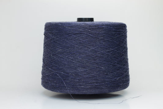 Fine, single-ply linen yarn in a rich Navy Blue. Reveals a crisp texture and subtle natural sheen, typical of pure linen fiber.