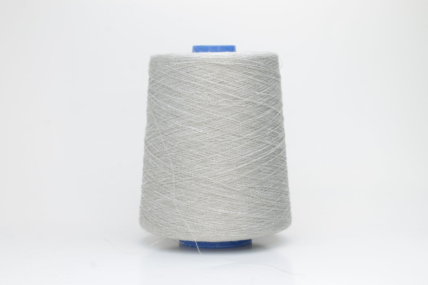 Fine, single-ply linen yarn in a rich charcoal gray. Reveals a crisp texture and subtle natural sheen, typical of pure linen fiber.