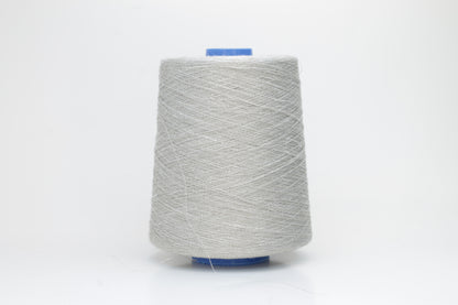 Fine, single-ply linen yarn in a rich charcoal gray. Reveals a crisp texture and subtle natural sheen, typical of pure linen fiber.