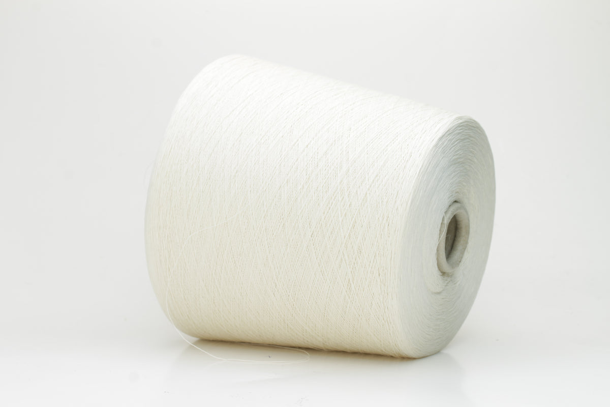 Close-up of pristine white, two-ply cotton yarn, tightly twisted with a subtle matte sheen. Smooth, uniform texture showcasing fine individual fibers.