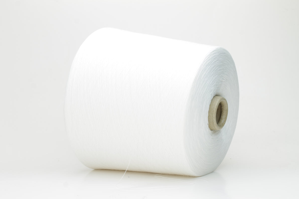 A pristine skein of bright pure white, two-ply cotton yarn, featuring a smooth, uniform twist and a subtle, sophisticated sheen.