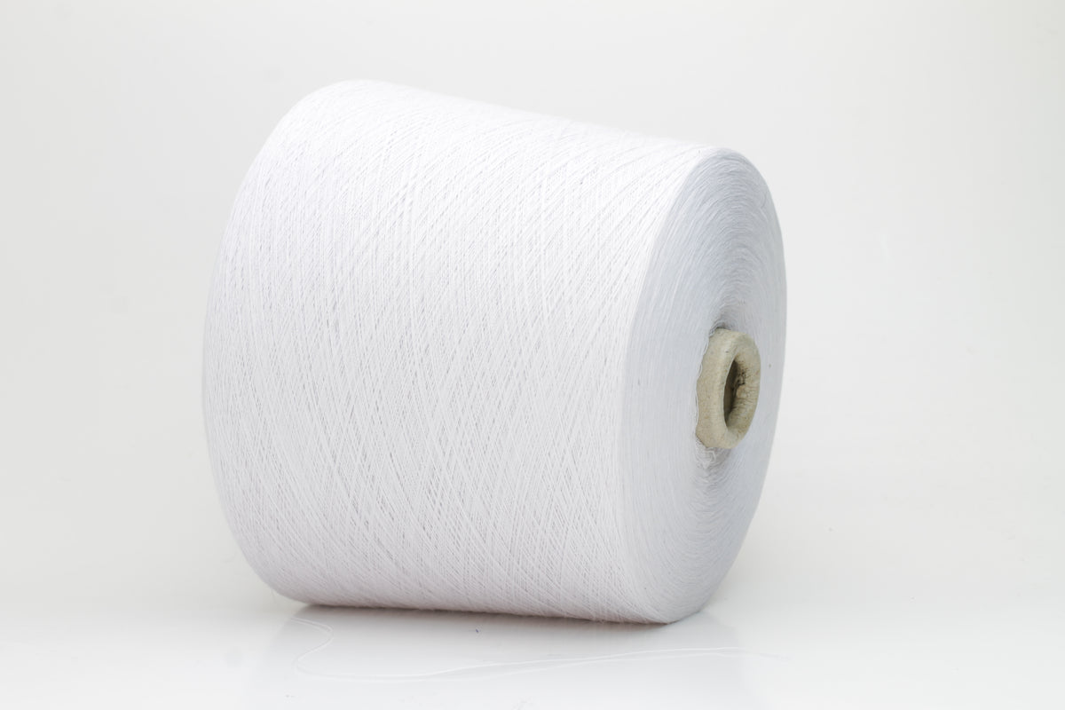 Close-up of a spool of pure white, smooth, 4-ply 100% cotton yarn with an even twist and soft matte finish, ready for textile projects.