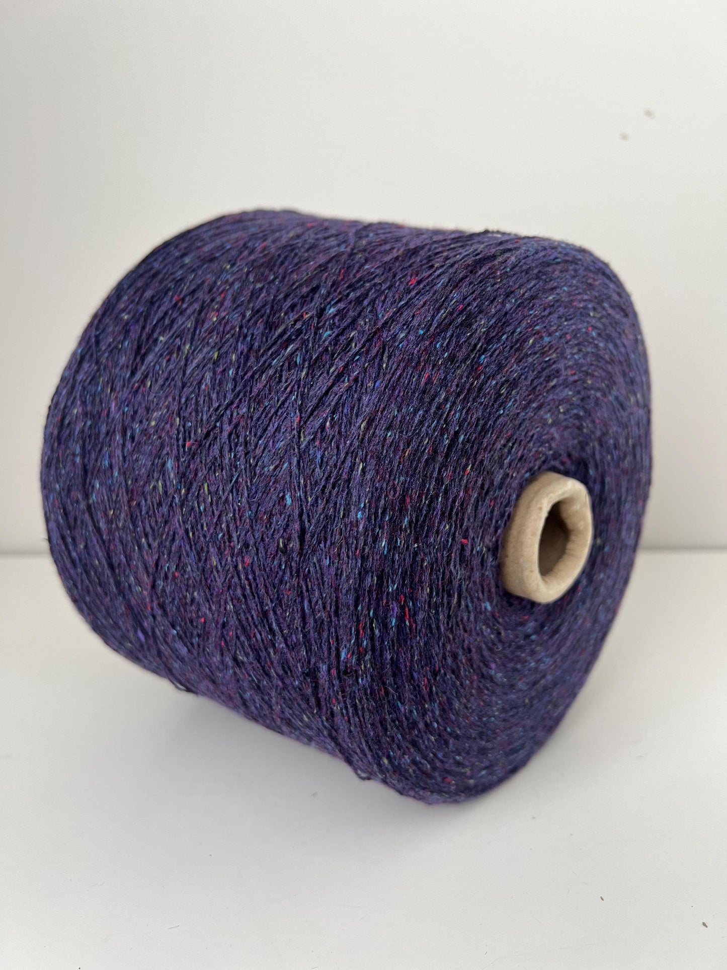 Wool 50%, Silk 25%, VI 10%, PA 10%. color VIOLA TWEED.Per 100 gr