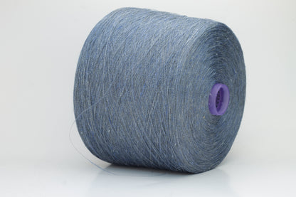 Fine, single-ply linen yarn in a rich Denim. Reveals a crisp texture and subtle natural sheen, typical of pure linen fiber.