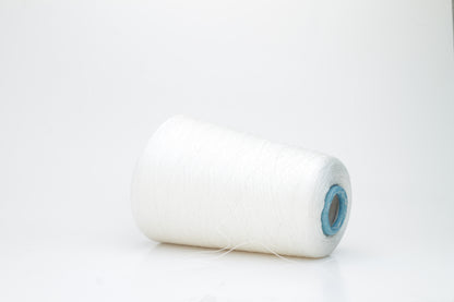 Fine, pure white silk yarn, tightly twisted with a subtle, radiant sheen. Smooth texture, uniform ply, elegant thread structure for delicate projects.