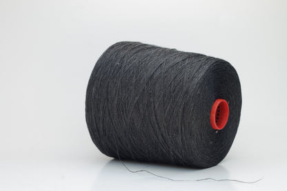 Fine, single-ply linen yarn in a rich Charcoal Black. Reveals a crisp texture and subtle natural sheen, typical of pure linen fiber.