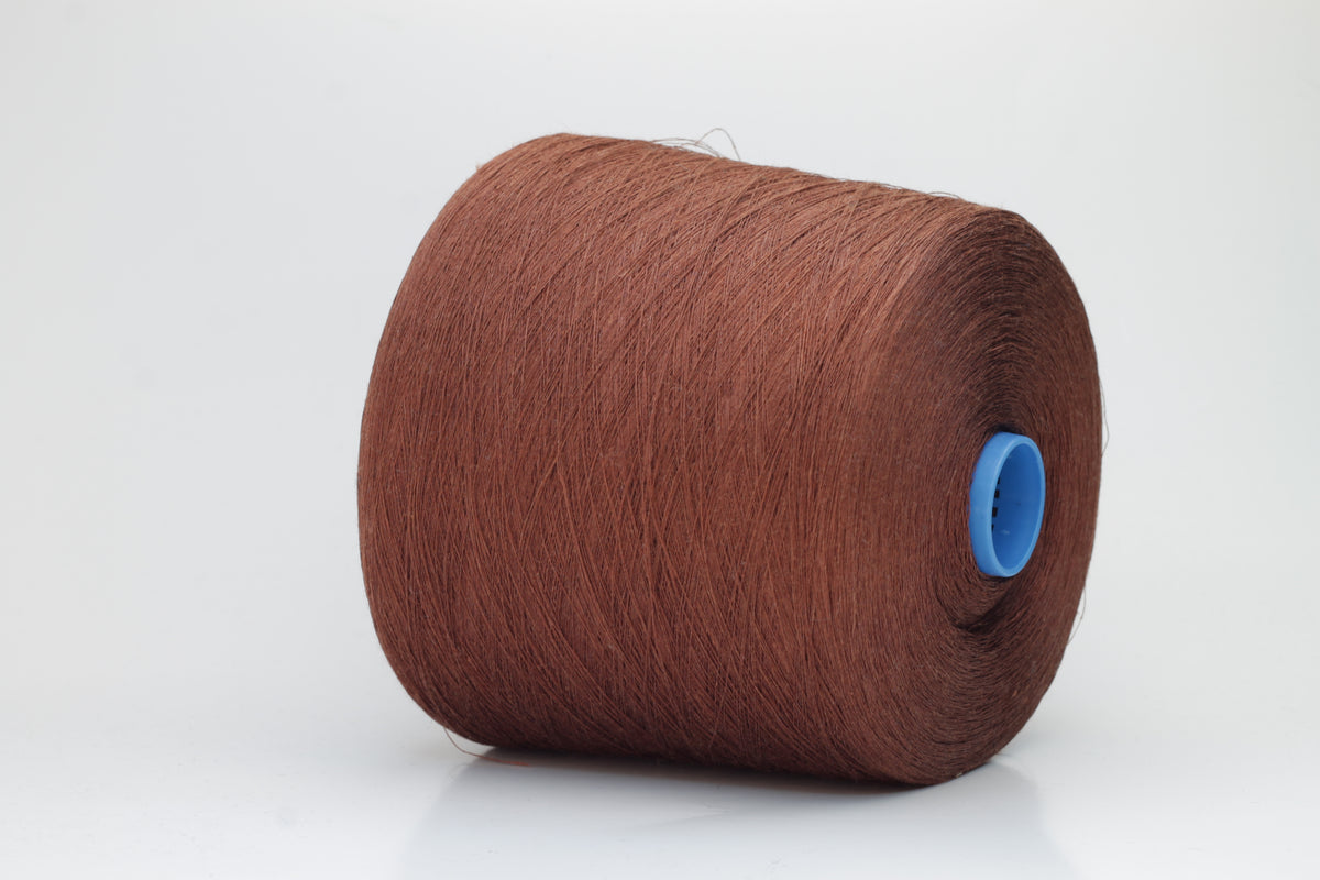 Fine, single-ply linen yarn in a rich Cacao. Reveals a crisp texture and subtle natural sheen, typical of pure linen fiber.