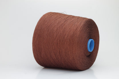 Fine, single-ply linen yarn in a rich Cacao. Reveals a crisp texture and subtle natural sheen, typical of pure linen fiber.