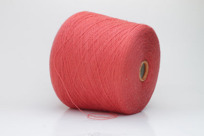 Close-up shot of vibrant red Zegna Baruffa Merino 100% Cashwool yarn, showcasing a tight 2/30 Nm ply twist and rich color depth, highlighting the wool's natural sheen and fluffy texture.